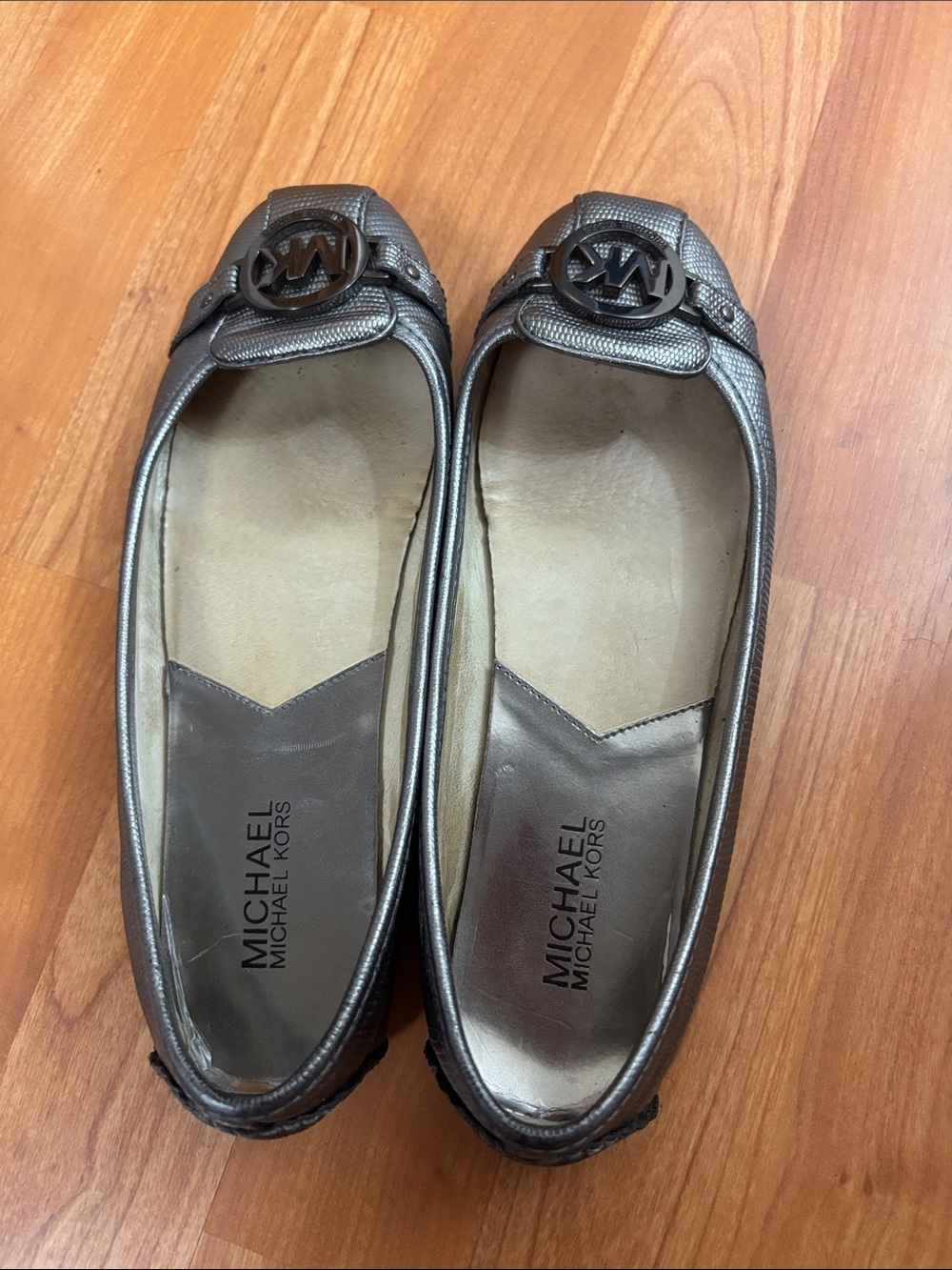 Michael Kors Metallic Pewter Logo Ballet Flats. Leather